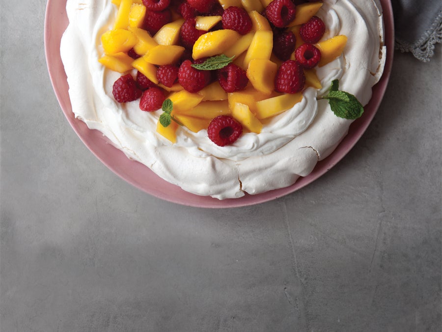 Pavlova With Mango Raspberries And Whipped Yogurt Cream Recipe Pavlova mit blaubeer kirsch curd frozen yogurt rezept. pavlova with mango raspberries and whipped yogurt cream