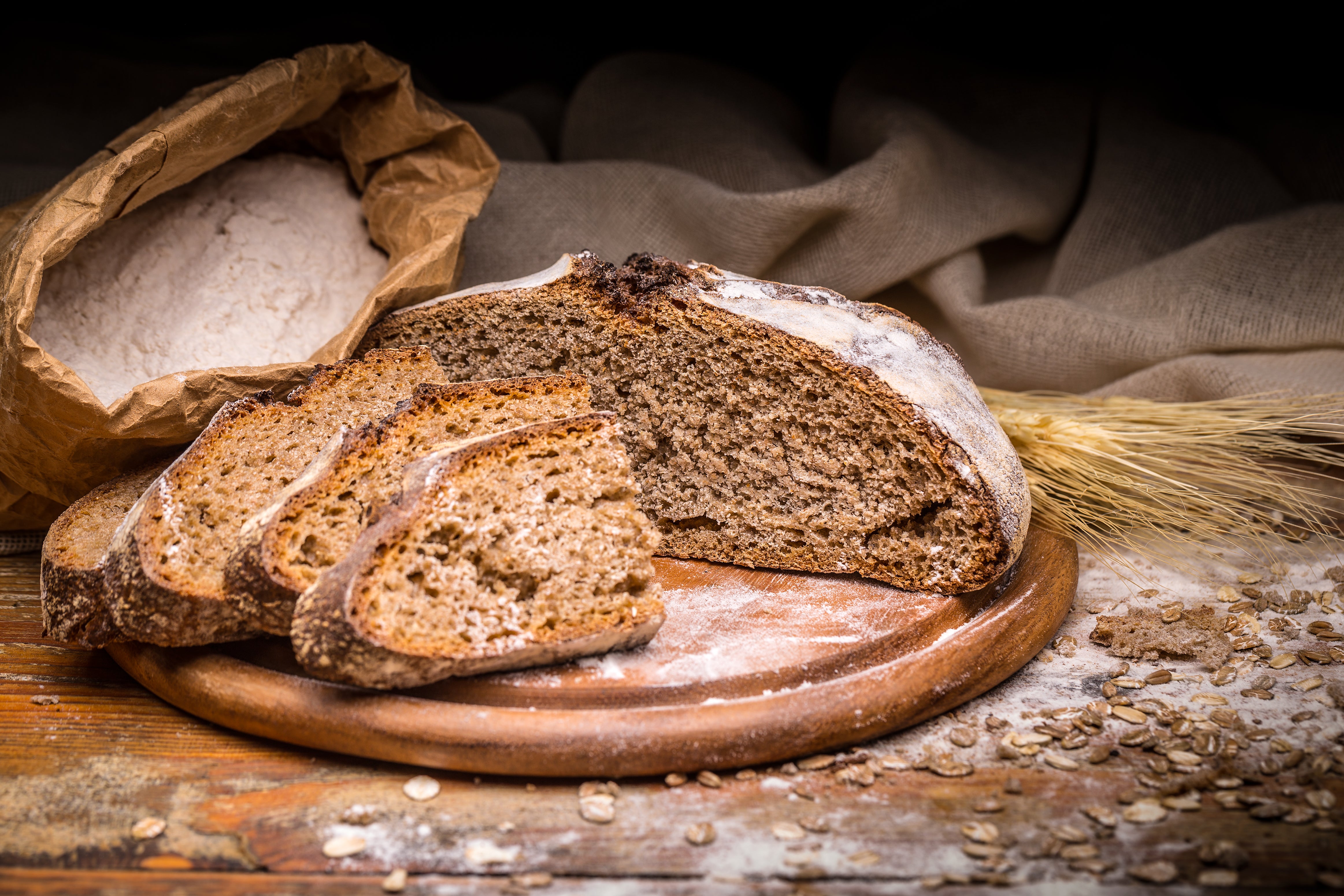 Wholegrain rye bread on cutting board