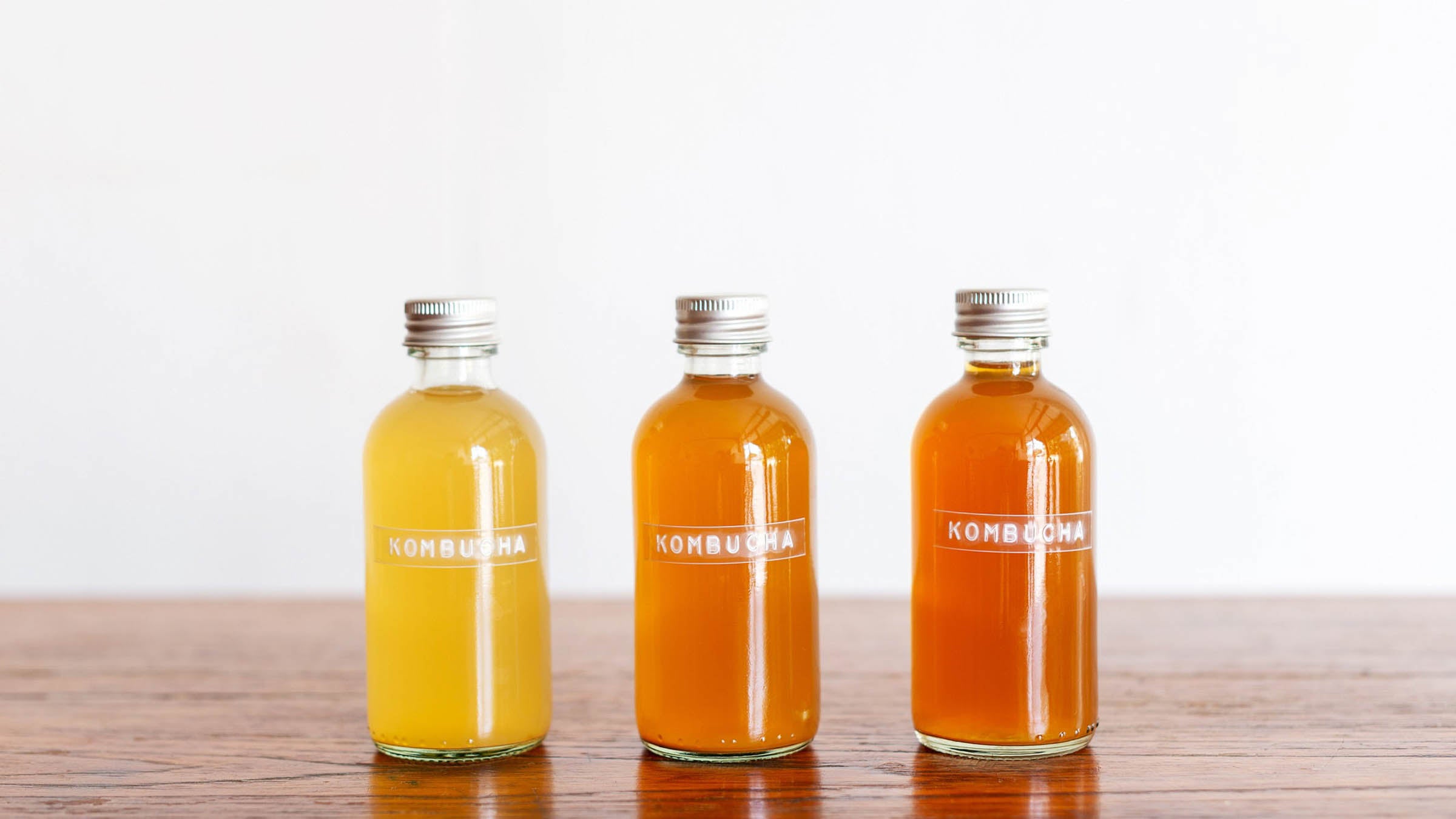 Three bottles of kombucha