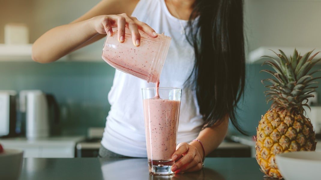 blender girl making a smoothie