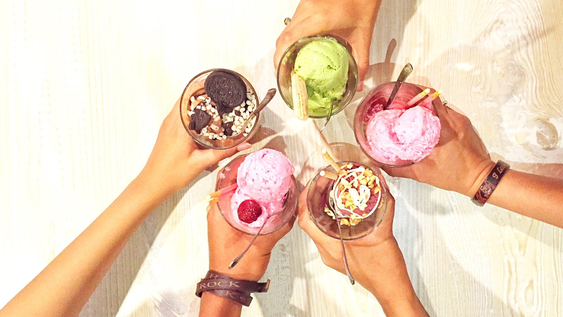 friends sharing homemade ice cream to represent vegan frozen treat recipes