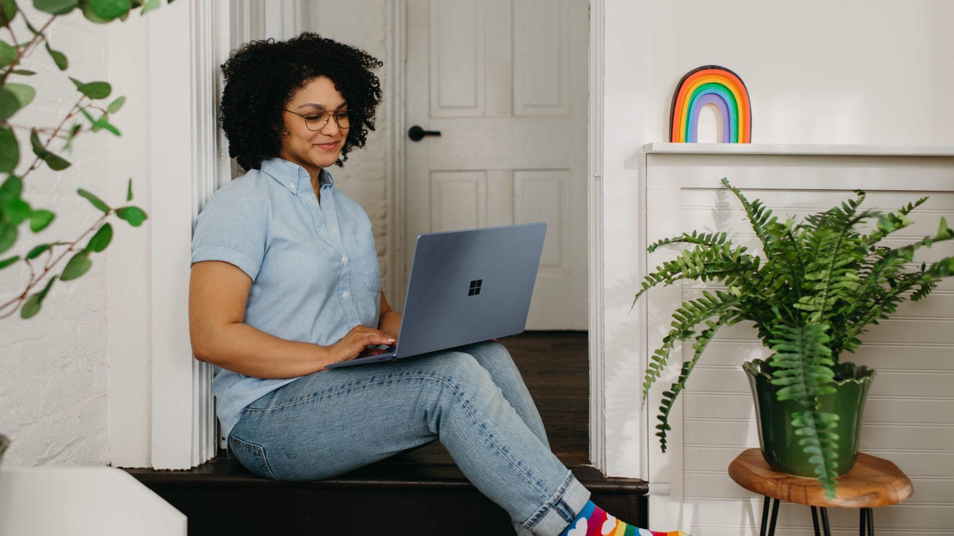 woman sitting and looking at laptop to illustrate outside learn